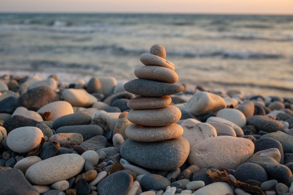 a stone tower on the shore